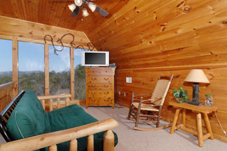 Lofted area with a mountain view
